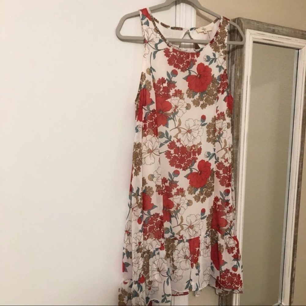 Entro floral ruffle hem cut out back dress (video)